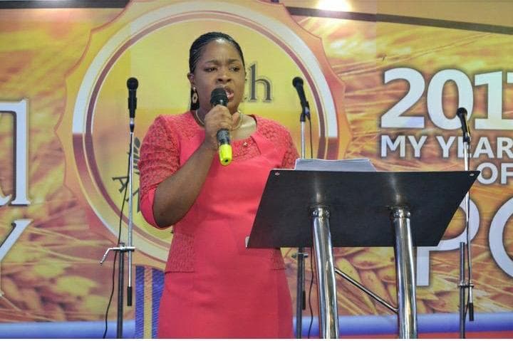 Woman with eyes closed and hands raised in intimate encounter with God